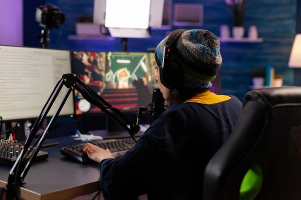 Professional streamer playing shooter games